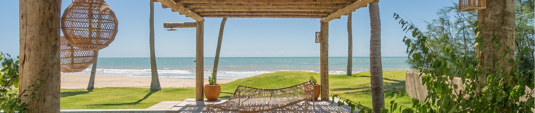 Wooden pergola with a hammock and sea view
